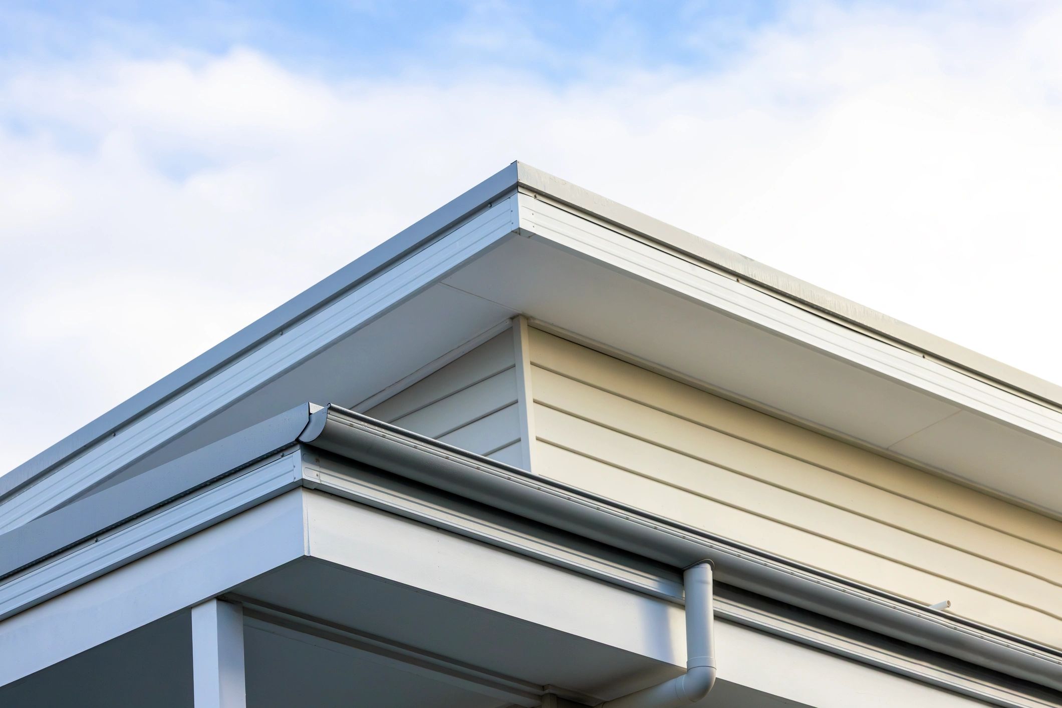 Close-up of a home's roofline and gutter