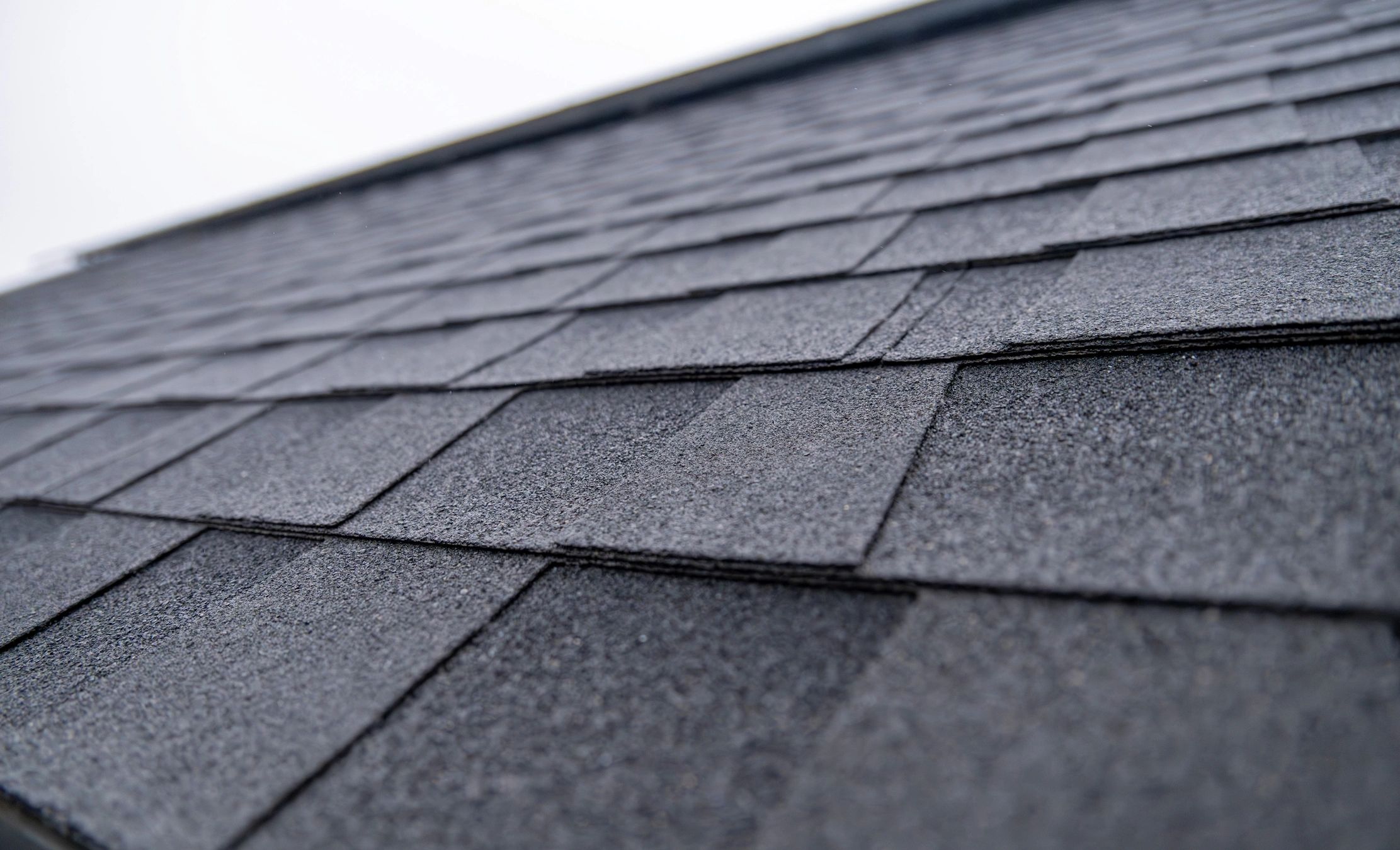 Close-up texture of asphalt roof shingles